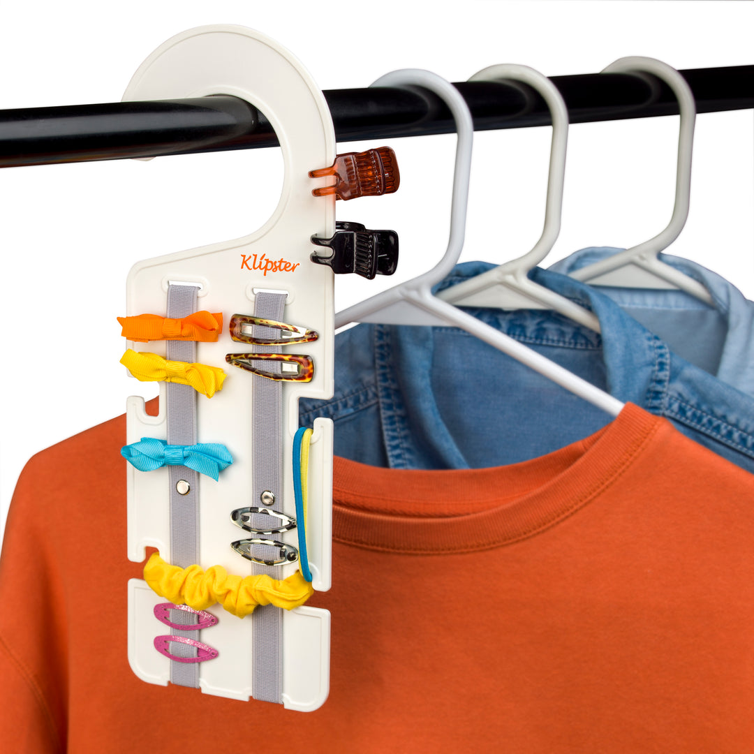 Classic Klipster hair accessories organizer with hanging hook. Compact, double-sided storage for clips, bows, scrunchies, ties, and more. Lightweight and travel-ready.