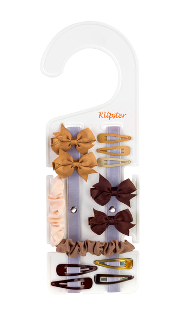 Classic Klipster hair accessories organizer with hanging hook. Compact, double-sided storage for clips, bows, scrunchies, ties, and more. Lightweight and travel-ready.