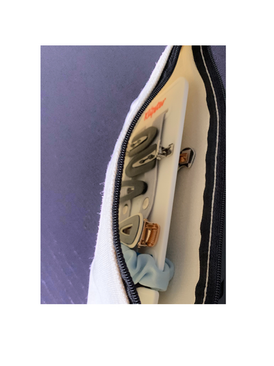 The canvas zippered Mini Klipster Storage Pouch is the perfect way to hold your Mini Klipster and keep your hair accessories protected.