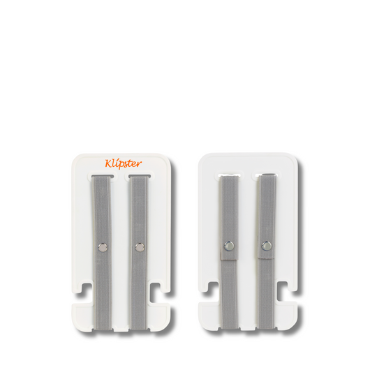 Mini Klipster hair accessories organizer next to an iPhone for size reference. Compact, portable storage for clips, scrunchies, and hair ties.