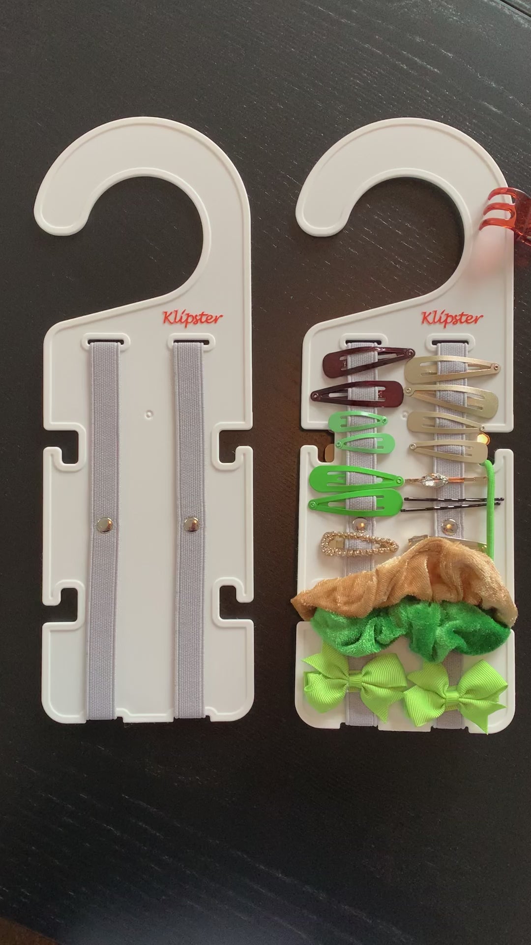 Video of the Classic Klipster Hair Accessories Organizer. Double-sided, lightweight, compact solution to hold hair clips, hair bows, scrunchies, hair ties, and more. A convenient hook allows it to hang in a closet, on a doorknob, or hook. Perfect for travel.