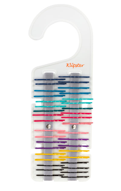 Classic Klipster hair accessories organizer with hanging hook. Compact, double-sided storage for clips, bows, scrunchies, ties, and more. Lightweight and travel-ready.